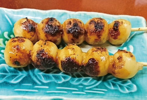Rice dumplings on a skewer