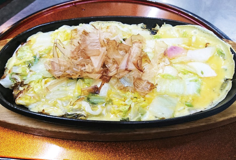 Grilled pickles on a hot plate