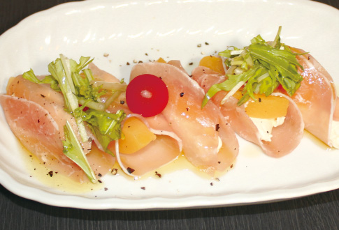 Prosciutto and peach cream cheese roll